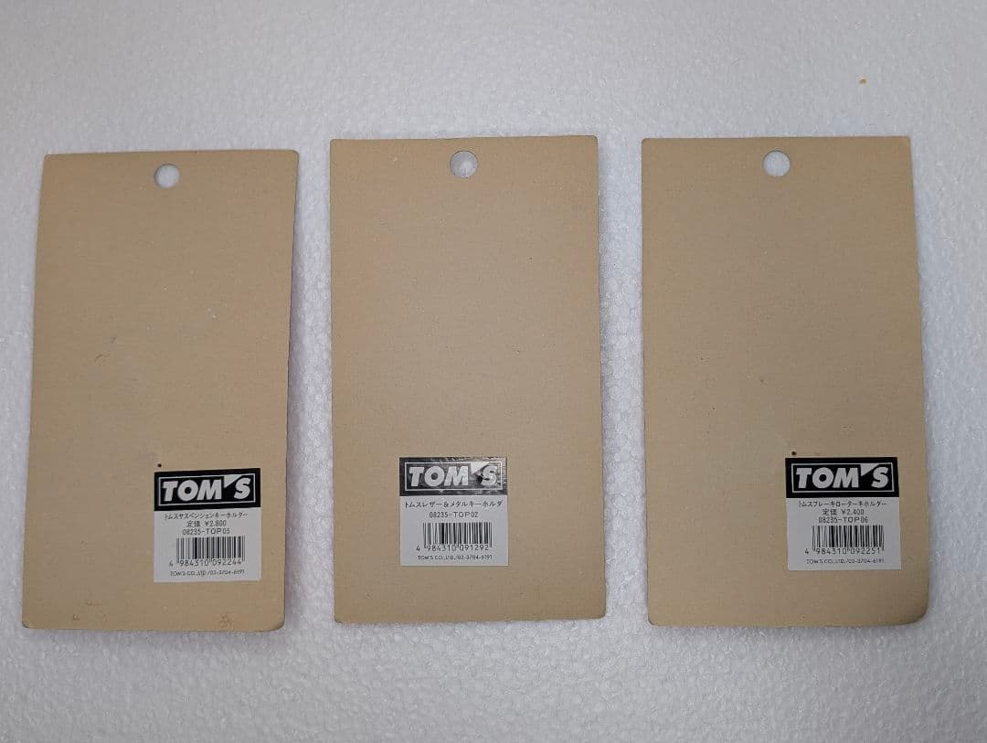 Tom’s racing key chain’s (new old stock)